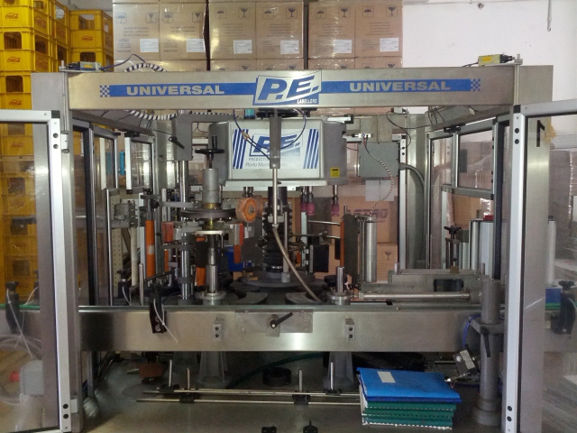 Used universal labeler with three locations